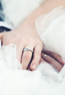 Hands with wedding rings