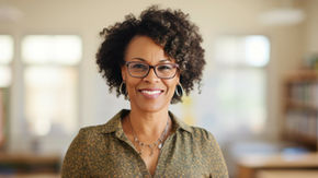Teacher smiling in a classroom