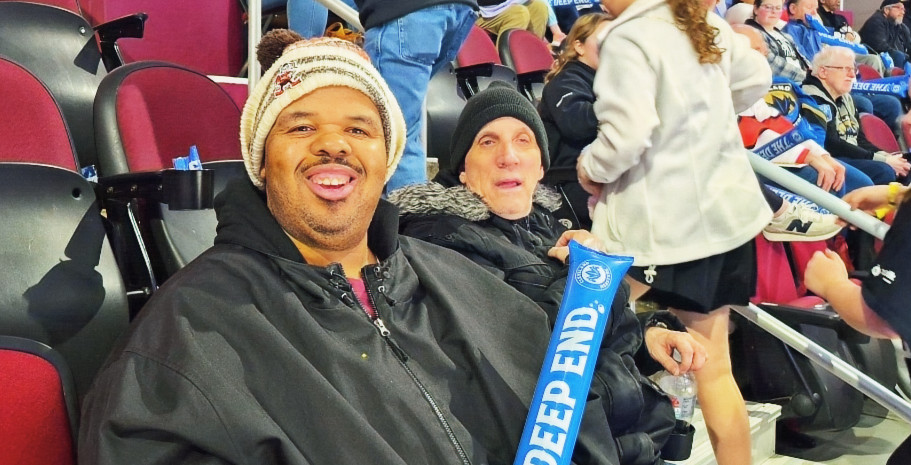 Two New Avenues individuals are cheering on the Cleveland Monsters.