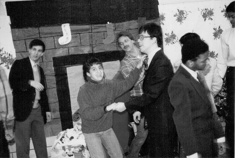 A group of individuals interacting. 