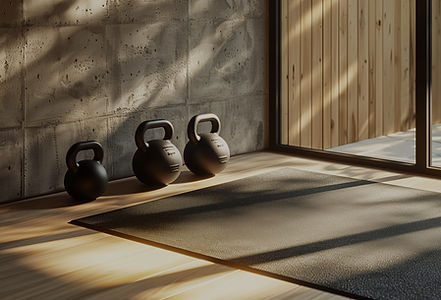 Kettlebells on Sunlit Gym Floor_edited.jpg
