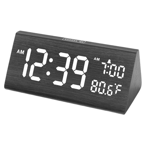 DreamSky wooden digital alarm clock on Quinton Heck's desk