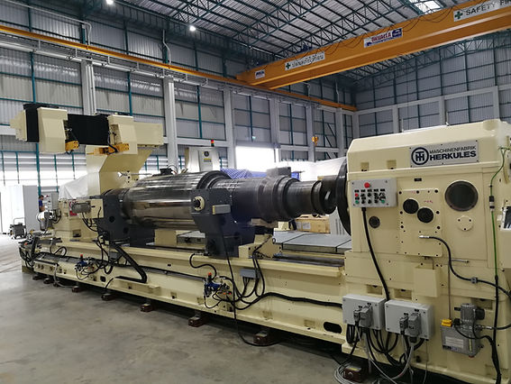 Re-built roll grinder