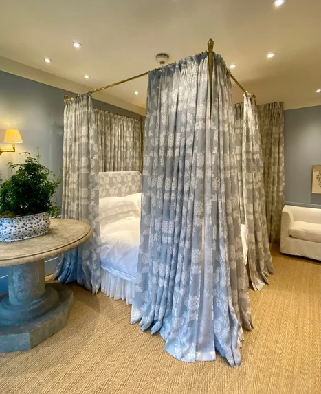 Four poster bed dressing.