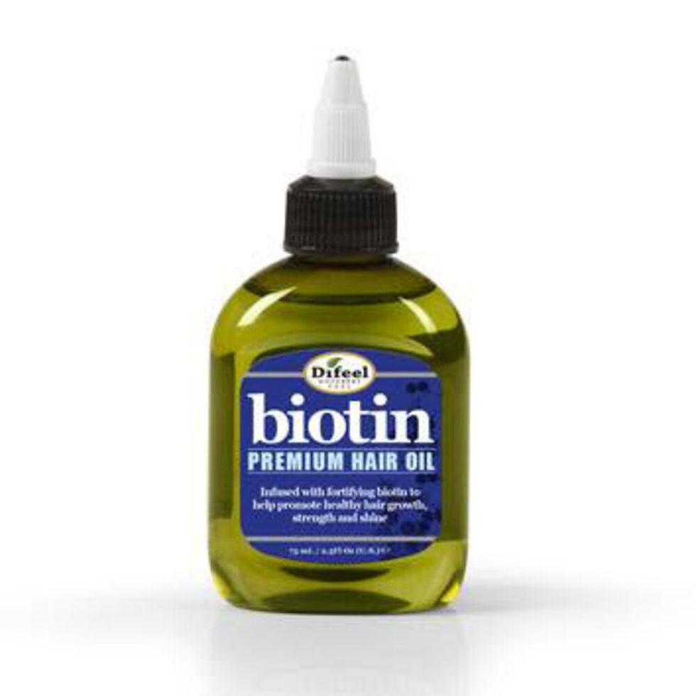 Thumbnail: Difeel biotin premium hair oil bottle labeled to promote healthy hair growth.