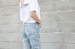 A Woman in Jeans and T-shirt