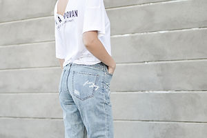 A Woman in Jeans and T-shirt