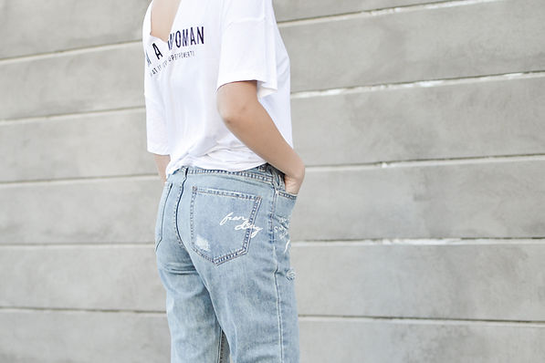A Woman in Jeans and T-shirt