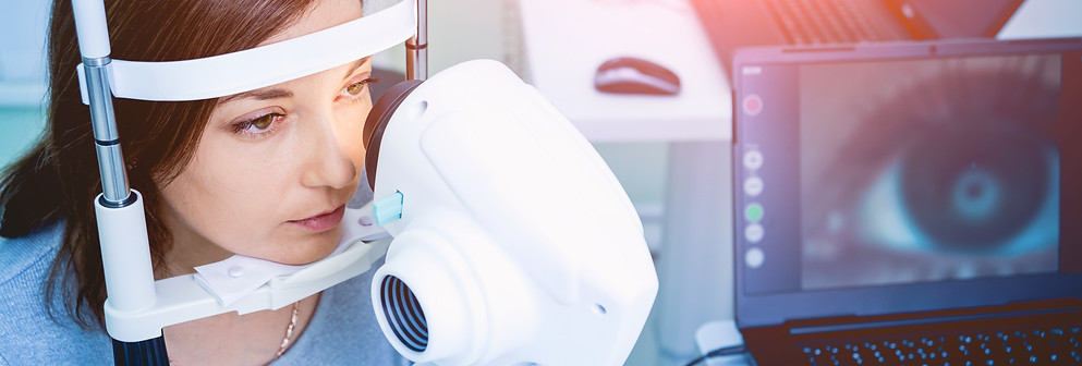 doctor-examining-woman-s-eyes-with-measurement-machine.jpg