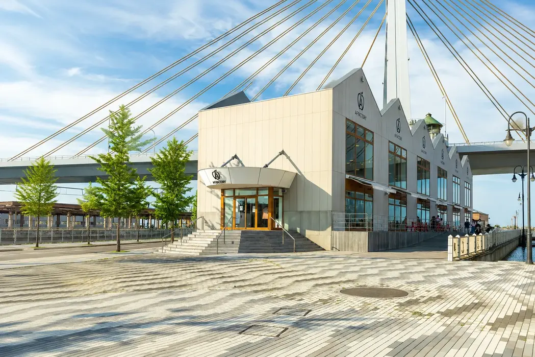 A-Factory cidery and market exterior with Aomori Bay Bridge
