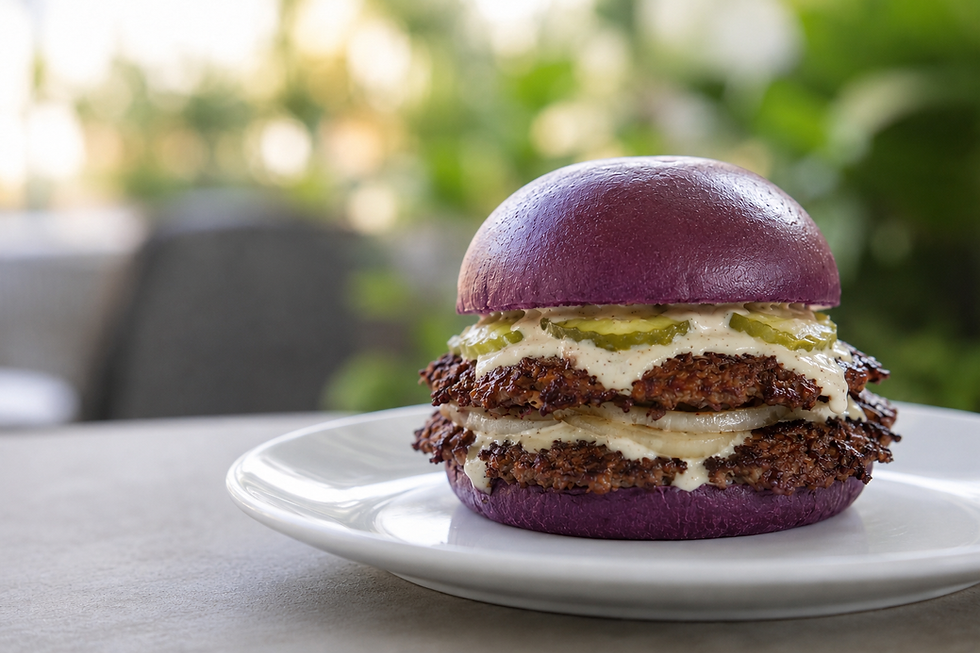 Double-patty smash burger on a purple ube bun with pickles.