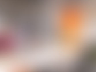 Artist surrounded by her paintings