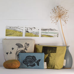 Dry point print with a collection of printed fabric items