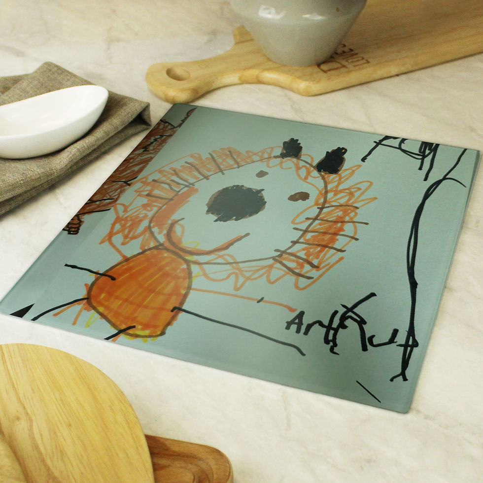Thumbnail: Our modern glass chopping board, personalised with your child's drawing and special message of up to 40 characters, makes a p