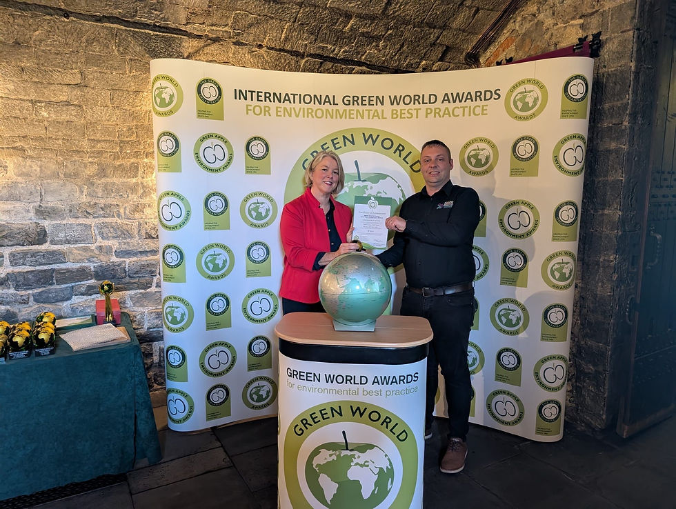 Mark Robinson receiving Green World Award for environmental best practice at Cardiff Castle sustainability awards ceremony