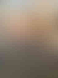 Operator carrying out detailed staircase paint removal using sandblasting equipment