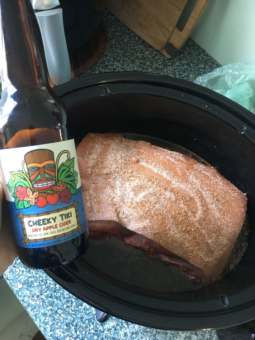 Raw pork shoulder in slow cooker