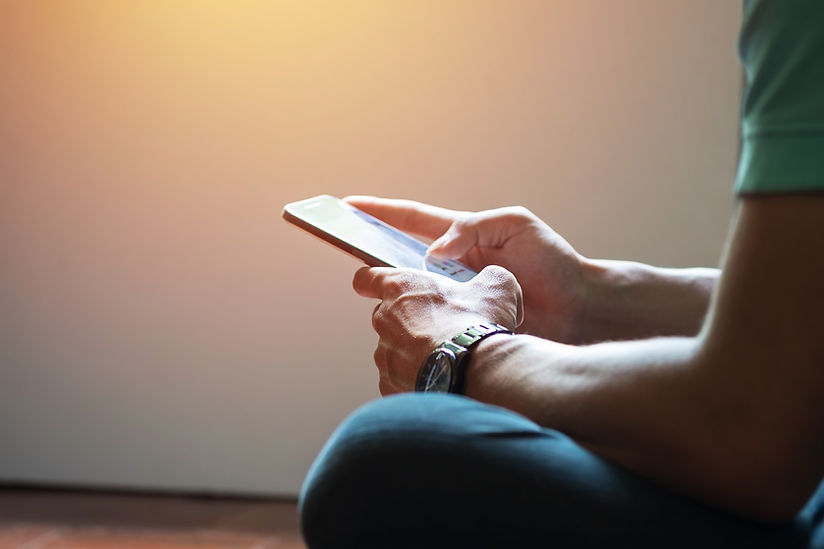 hipster-using-touch-screen-smart-phone-hands-close-up-vintage-colors.jpg