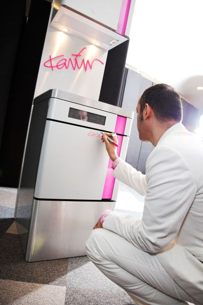 karim-rashid-signs-up-on-oven.jpg