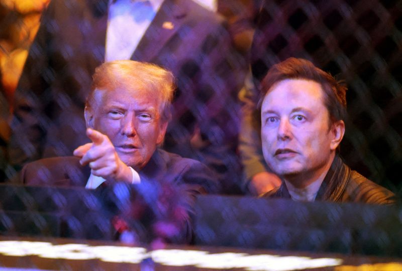 Trump and Musk sit together
