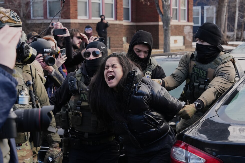 federal_immigration_agents_filmed_dragging_a_woman_from_her_car_in_minneapolis
