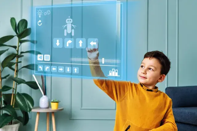 Child plays with a holographic screen