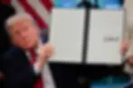 Trump signing Executive Order 14317, Schedule G, into law.
