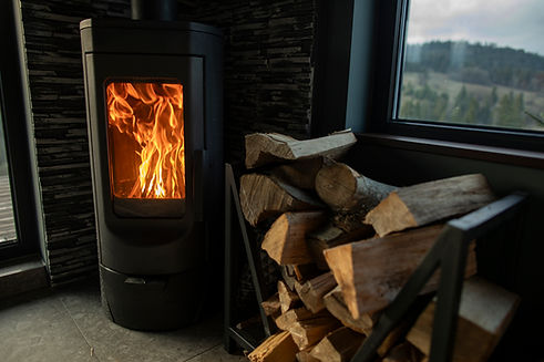 stack-firewood-modern-burning-stove-corner-cozy-house-room-with-large-windows.jpg
