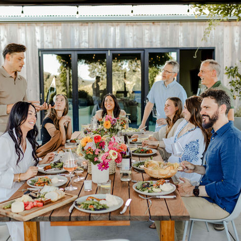 Group of people have a celebratory meal