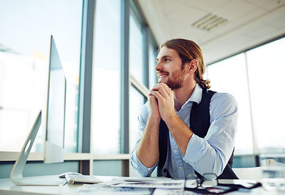 Professional Smiling at Desk