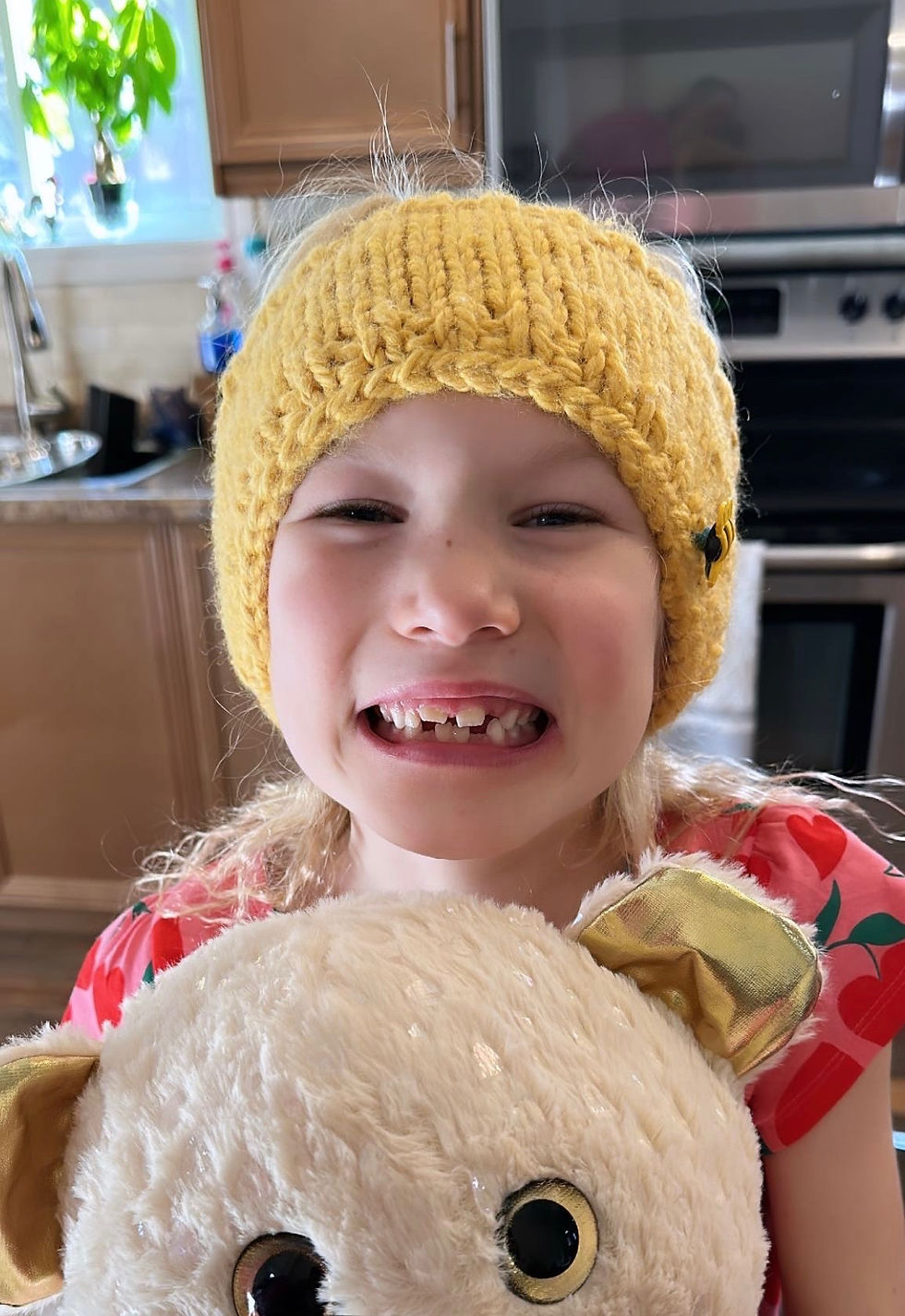 My sister in law sent me this photo when Skylar received her knitted headband in the mail.