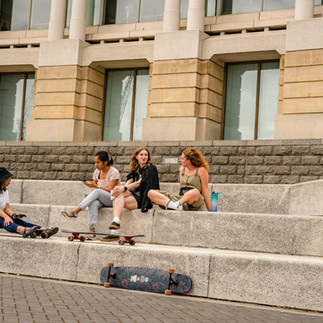 Skaters chatting at on steps