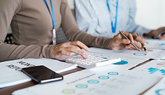 businesspeople-team-collaboration-analyzing-monthl-2025-02-20-06-39-30-utc.jpg