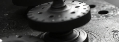 an image ofcropper punch and dies black and white aesthetic industrial not 1800s close up