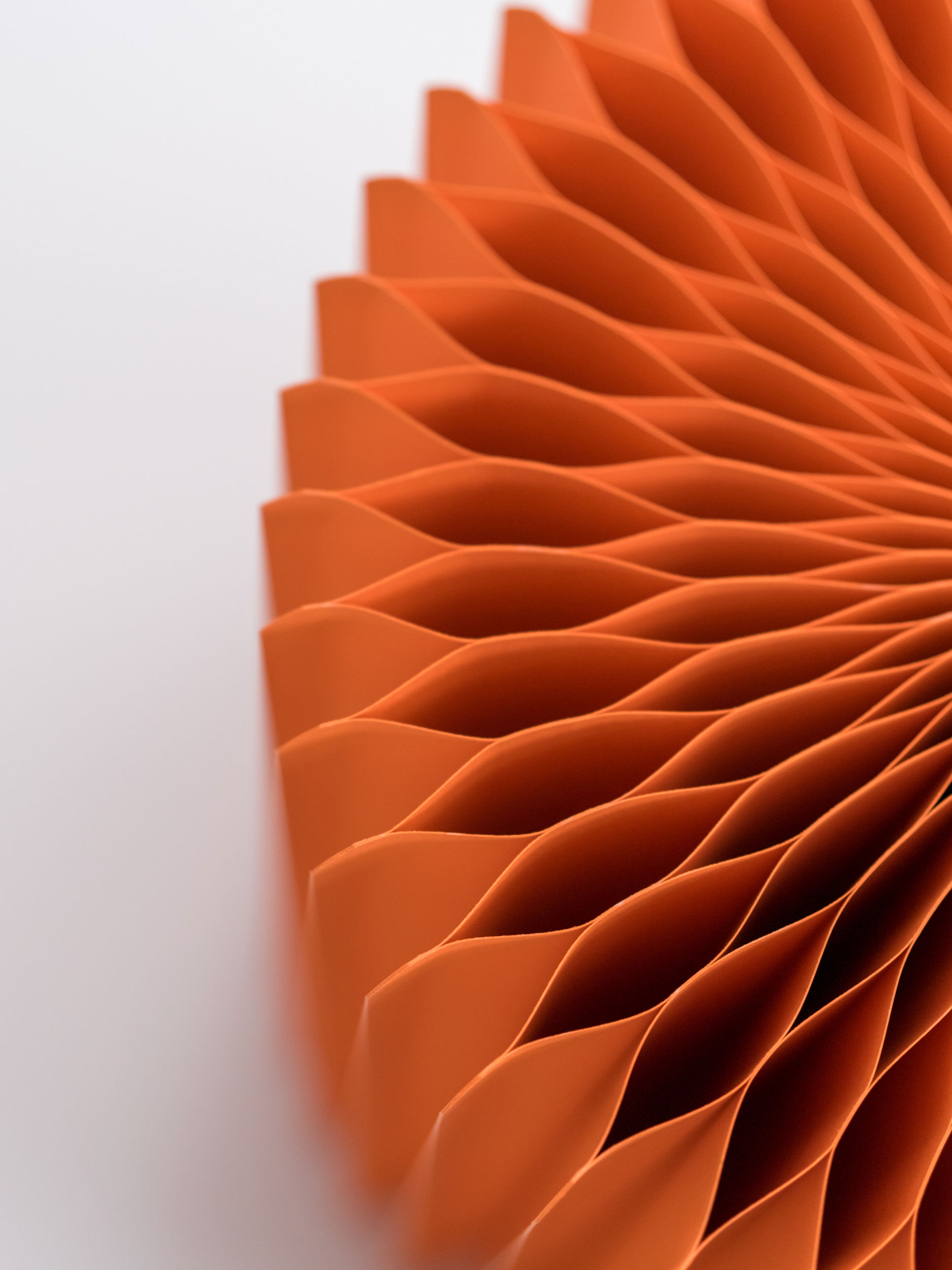 Orange Concertina Honeycomb Plant Stand close-up