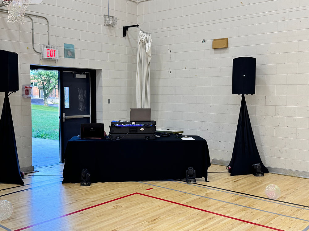 Hamilton DJ services setup in a gym