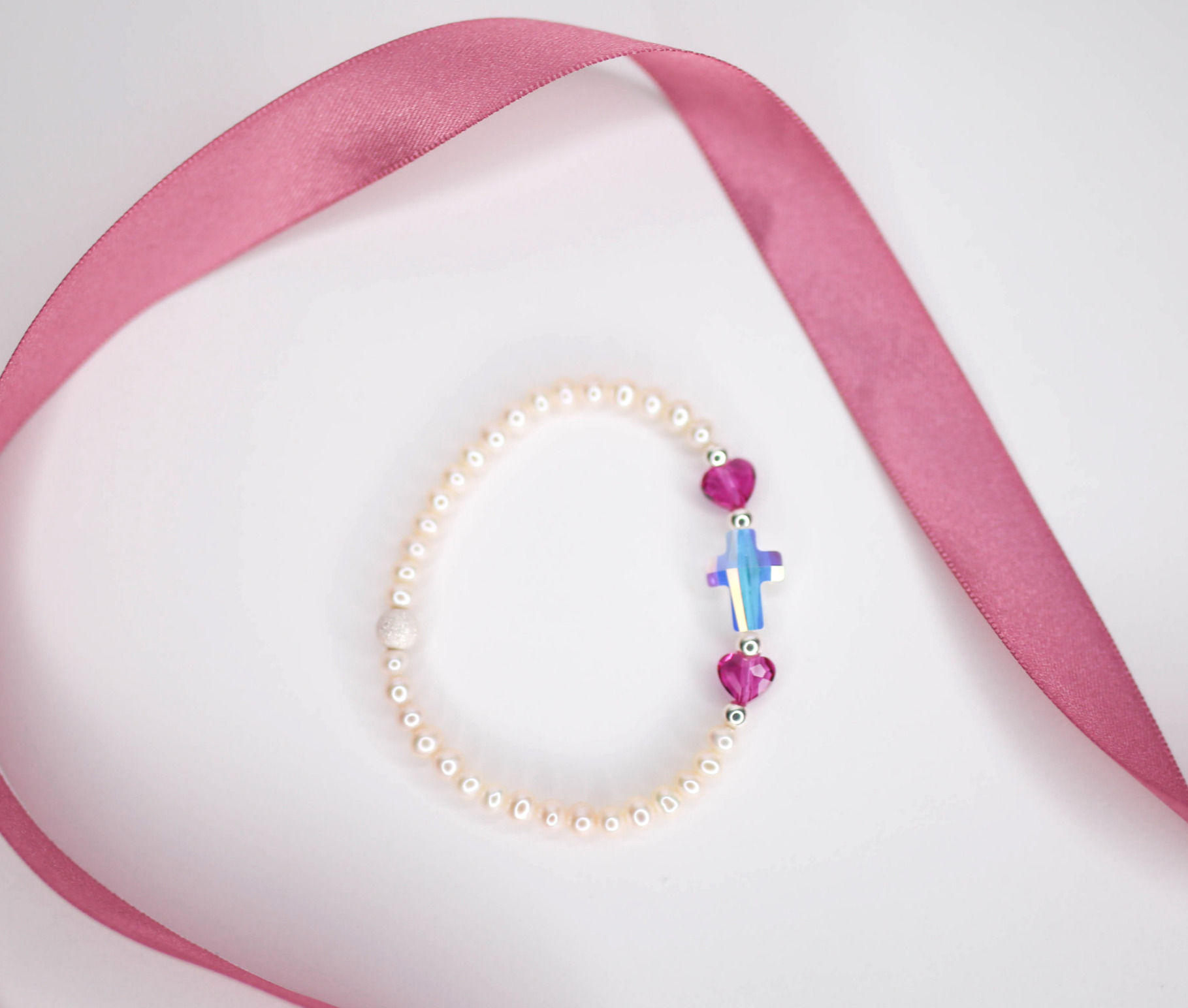 Small Freshwater Ivory Pearl With Crystal Hearts And Cross Bracelet