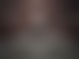 Quonset Reception Space light up at night. Featuring beautiful chandeliers.