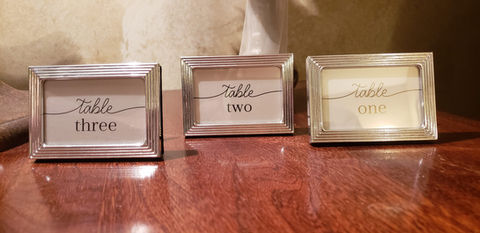 metal silver frames with table numbers