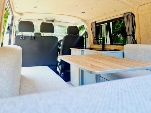 view of a u lounge bed in a campervan