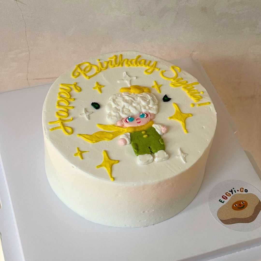 Whimsical Boy Character Cake with Yellow Stars and Green Outfit Design