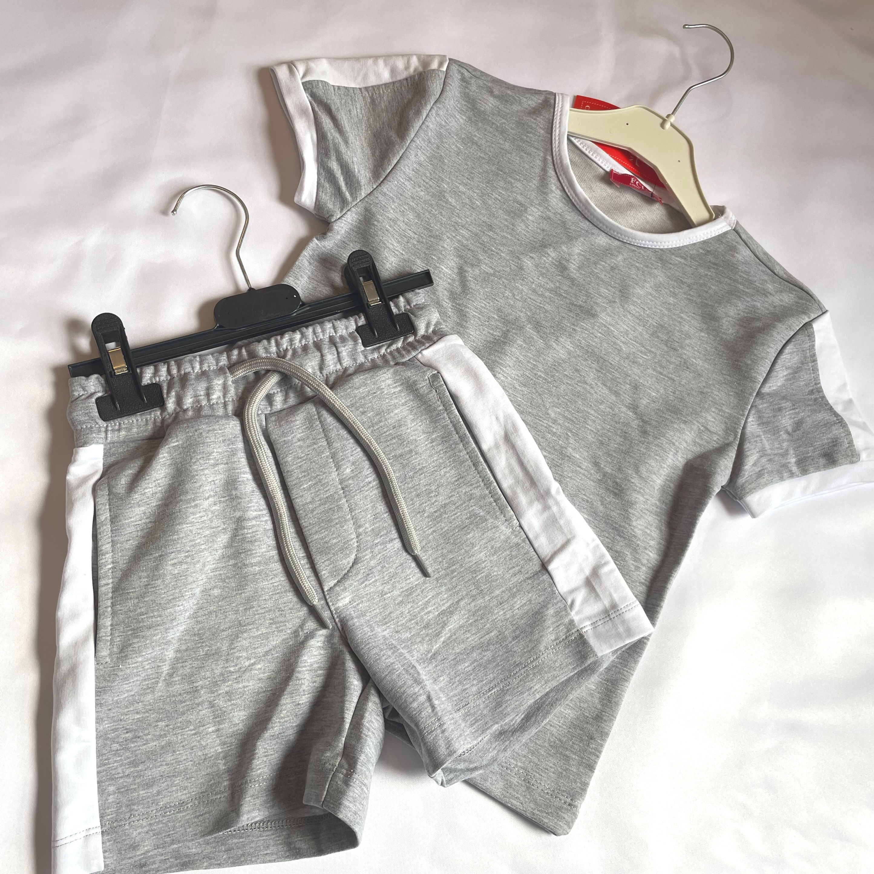 Boys gray shorts and t-shirt with whit panelling 