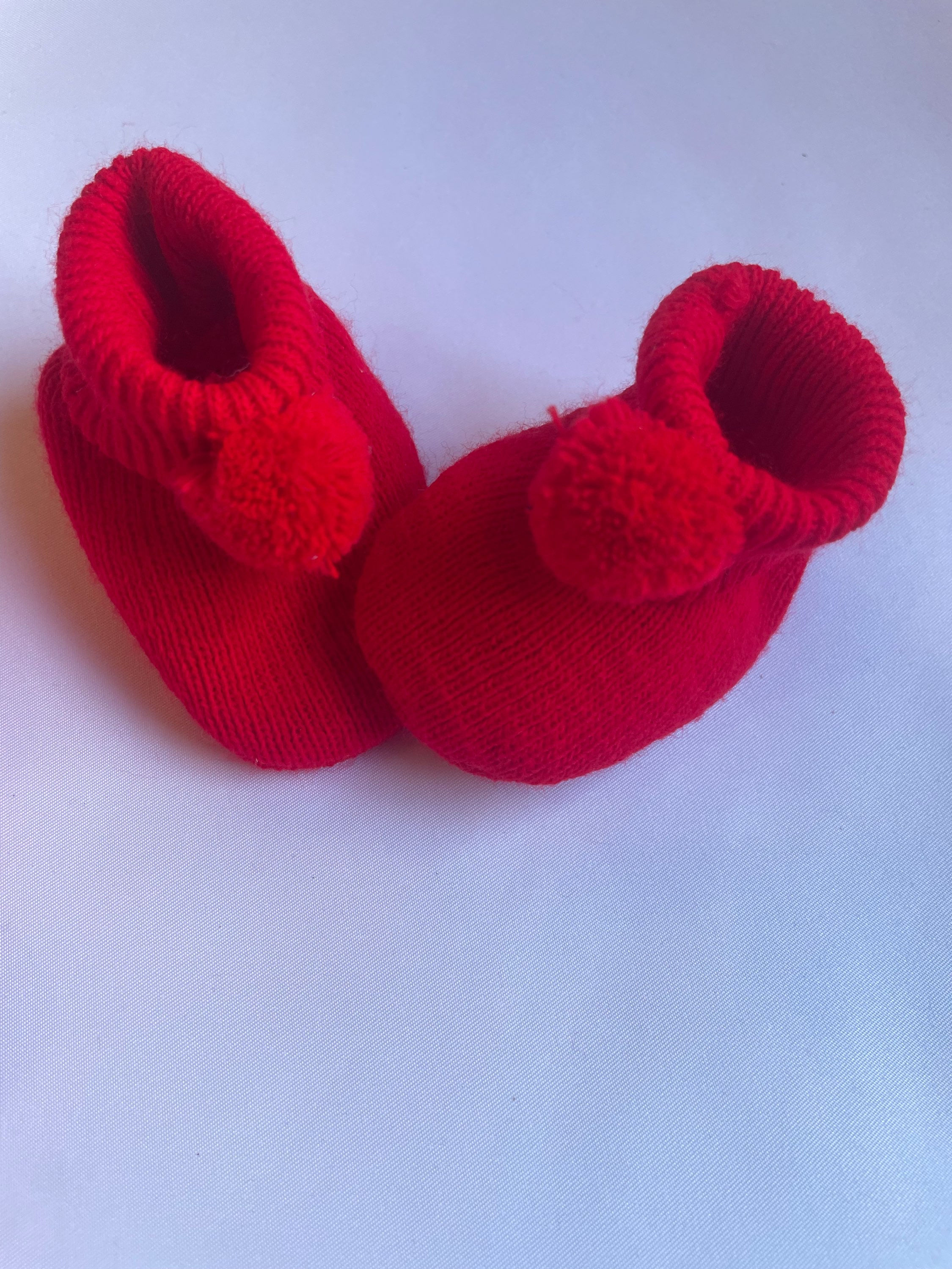 Red Pom Pom booties 