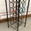 Thumbnail: Tall wrought metal wine rack