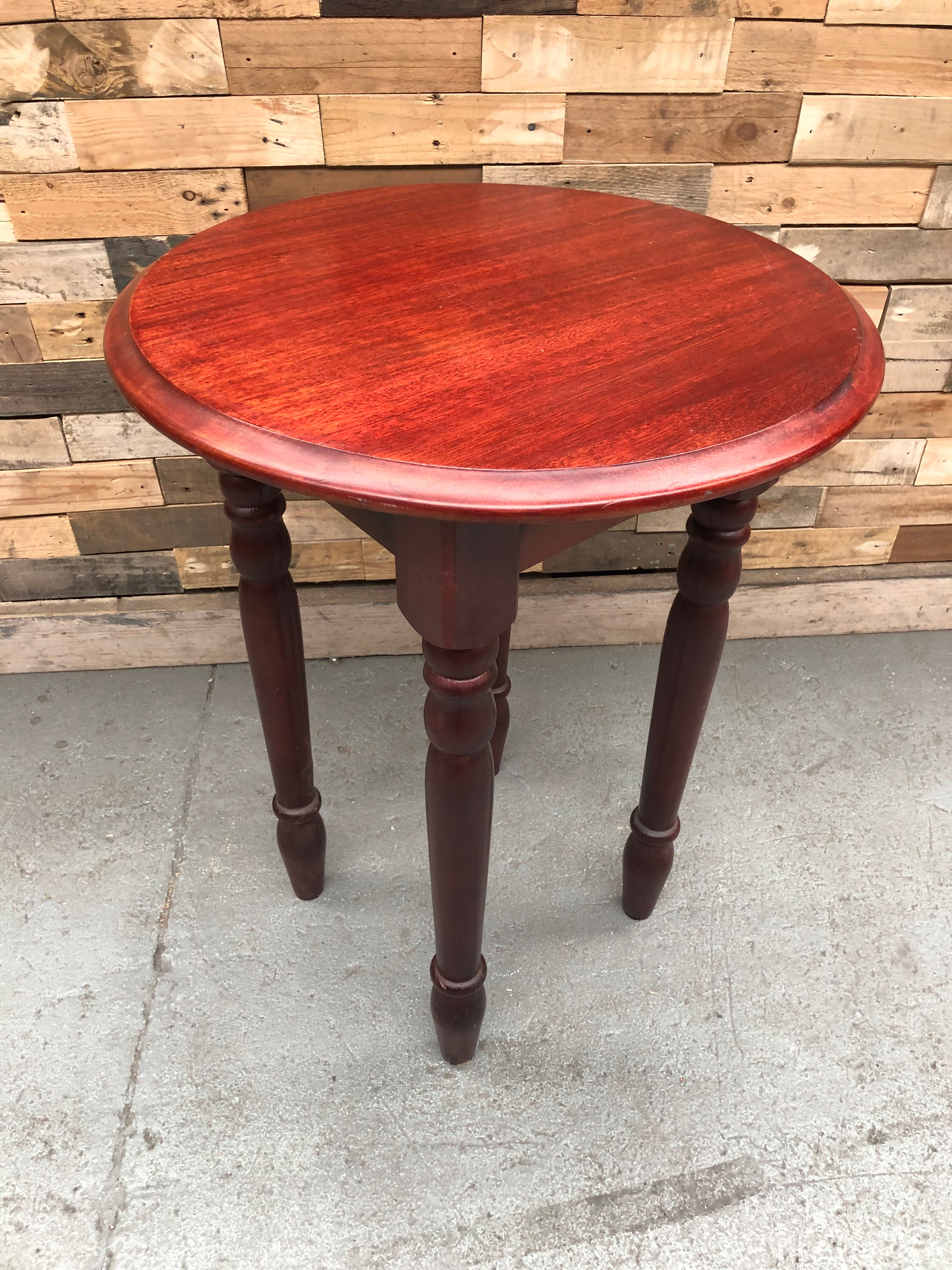 Mahogany effect round occasional table