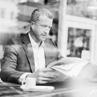 Man Reading Newspaper_edited.jpg