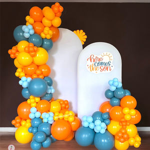 Here Comes the Son baby shower balloon backdrop with layered white Chiara walls and blue, orange, and yellow balloons in Rexford NY