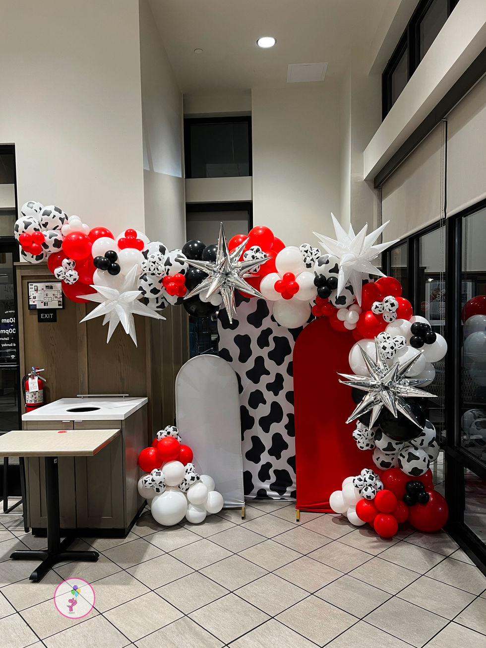 Cow print balloon photo opportunity at Chick-fil-A Clifton Park for Cow Appreciation Day