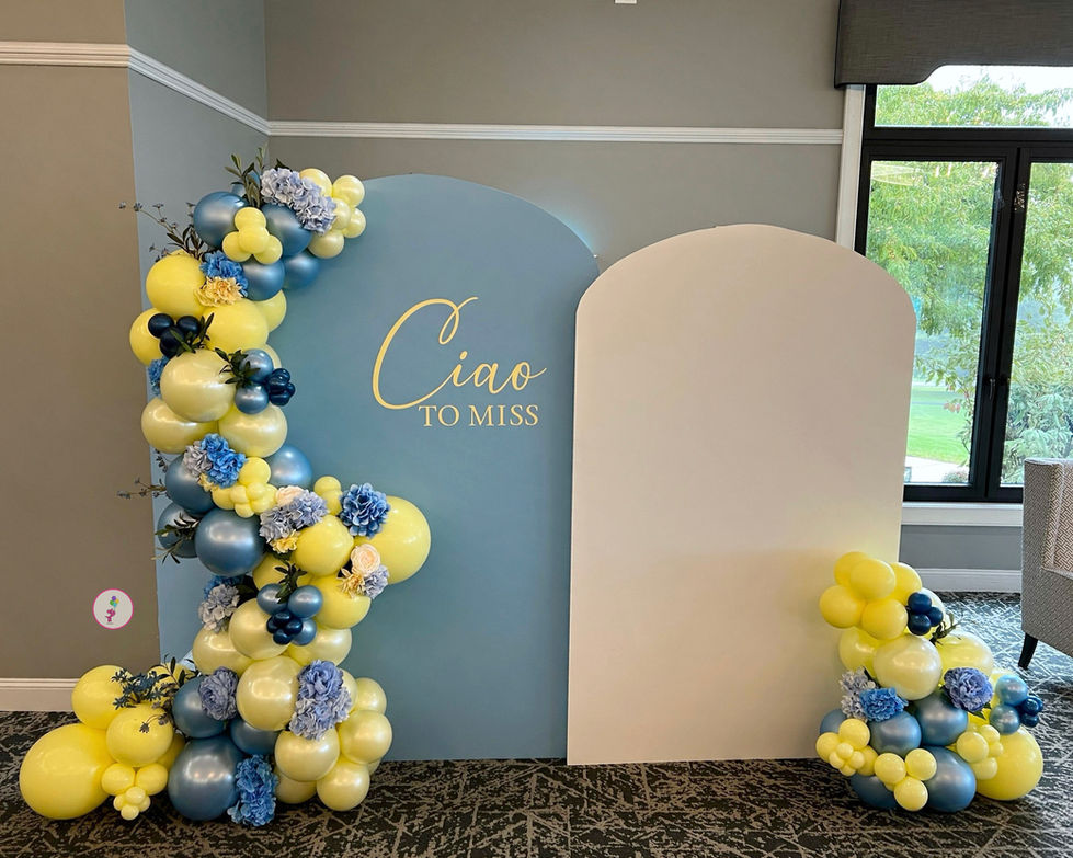 Blue and yellow Amalfi Coast bridal shower balloon garland with double Chiara backdrop, florals, and Ciao to Miss lettering at The Vista in Clifton Park, NY.