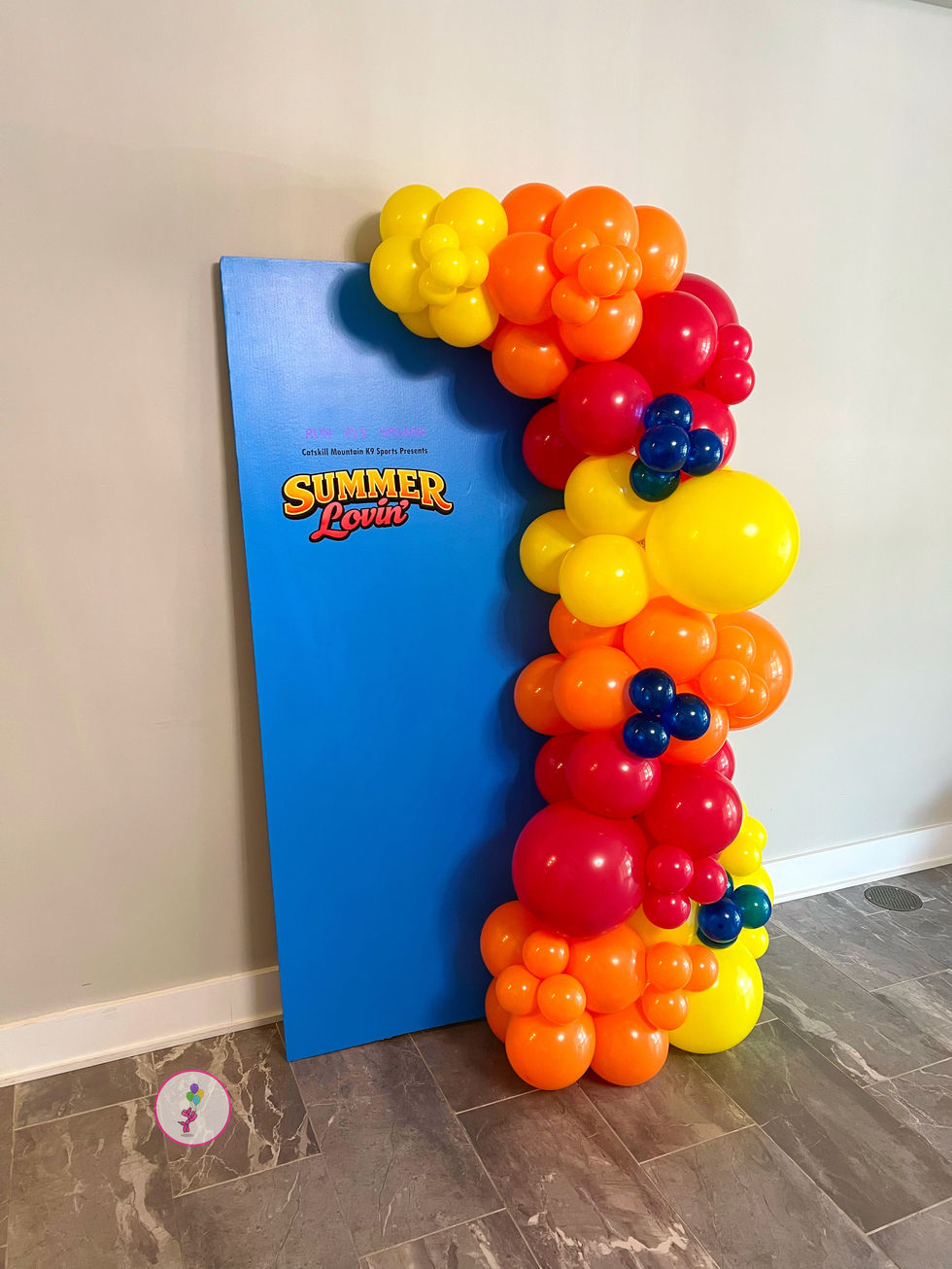 Left-side view of the Summer Lovin' balloon backdrop with vibrant organic balloons